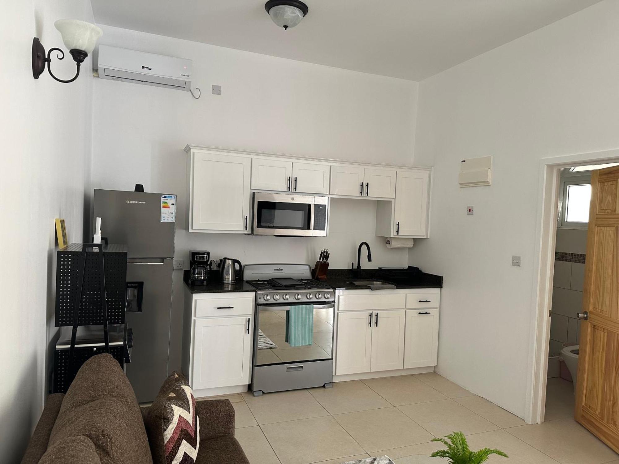 Eldorado Guesthouse & Car Rental Roseau Quarto foto